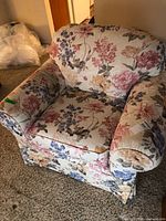 Front view of floral Sklar-Peppler armchair