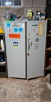 Closed cabinet front view with stickers