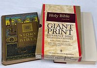 Two books and Bible slipcase showing titles and covers