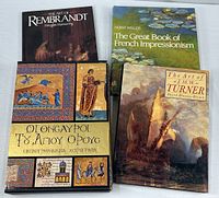 Group shot showing all four art books including slipcased Greek volume