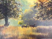 Close view of left side showing deer and foliage