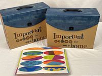 Overview of two file boxes and one divider packet