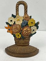 Full view of doorstop showing overall form and paint