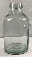 Full view of clear glass 5-gallon carboy
