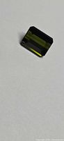 Emerald-cut green tourmaline face-up view