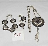 Full view of necklace, bracelet and earrings set