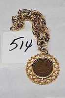 Entire bracelet with coin charm