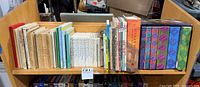 Full shelf view showing Dr. Seuss, mixed children’s titles and Harry Potter hardcovers