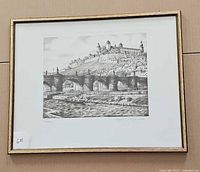 Full view of framed etching on wall