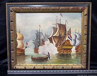 Front view of framed naval scene painting