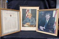 All three framed presidential prints displayed side by side