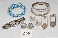 All seven jewelry pieces laid out