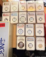 Full set of 16 NGC slabs with storage box
