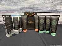 All 10 hair care tubes grouped on table