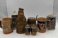 Group shot of all eight steins