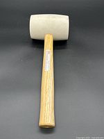 Front view of HDX white rubber mallet showing rubber head and wooden handle