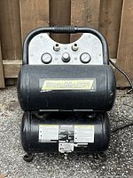 Front view showing MotoMaster logo and twin tanks