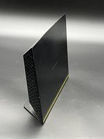 Side angle displaying slim profile and stand