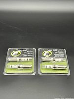 Both sealed two-pack blister cards displayed front view