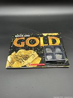 Front cover of book with stone case attached