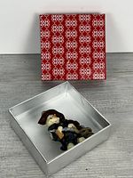 Pin in gift box showing front detail