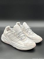 Three-quarter front view of both sneakers