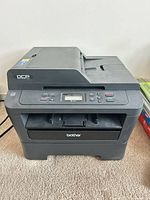 Front and top view of Brother DCP-7065DN printer