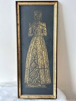 Full view of framed brass rubbing artwork