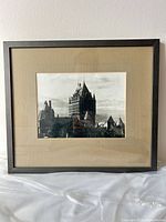 Full view of framed photograph showing mat and frame condition