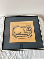 Front view of framed cat sketch