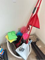 Basket with assorted cleaning tools