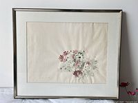 Full view of framed painting showing mat, sheet and frame