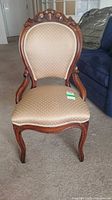 Front view of upholstered accent chair