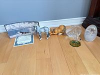 Full lot showing all items on wood floor