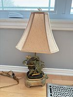 Full view of lamp with shade and cord visible