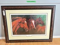 Full view of framed print with mat and frame visible