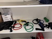 Full set laid out showing bands, accessories, bag and box