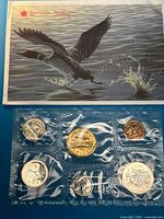 Full set showing envelope and blister with six coins