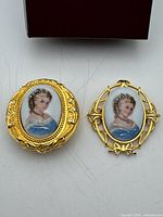 Trinket box and brooch side by side showing portraits and gold-tone frames
