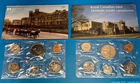 Both coin sets in sleeves and cardboard holders; shows all coins and exterior artwork