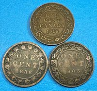 Three Canadian large cents reverse sides showing dates 1918, 1888, 1903