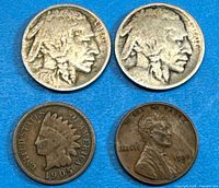 Group shot of four coins: two Buffalo nickels, 1905 Indian Head cent, 1926-S Wheat cent