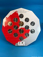 Full octagonal display card with all 14 coins visible