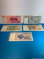 All five Yugoslav dinar banknotes laid out front side visible