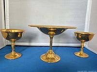 Front view of tazza and two goblet compotes