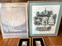 All four framed prints standing together