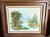 Framed oil landscape painting signed Melton