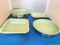 all four mint green interior stainless pans