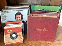 Front view showing LPs, binder of 78s and stack of 45s