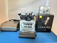 Front view of all cameras, viewer and boxes